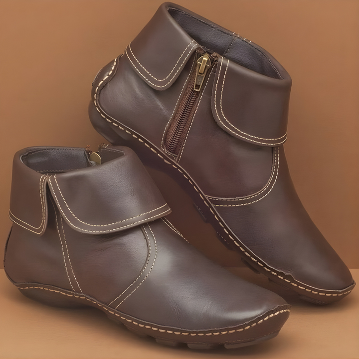 Dark brown leather ankle boots with fold-over cuff and hand-stitched sole