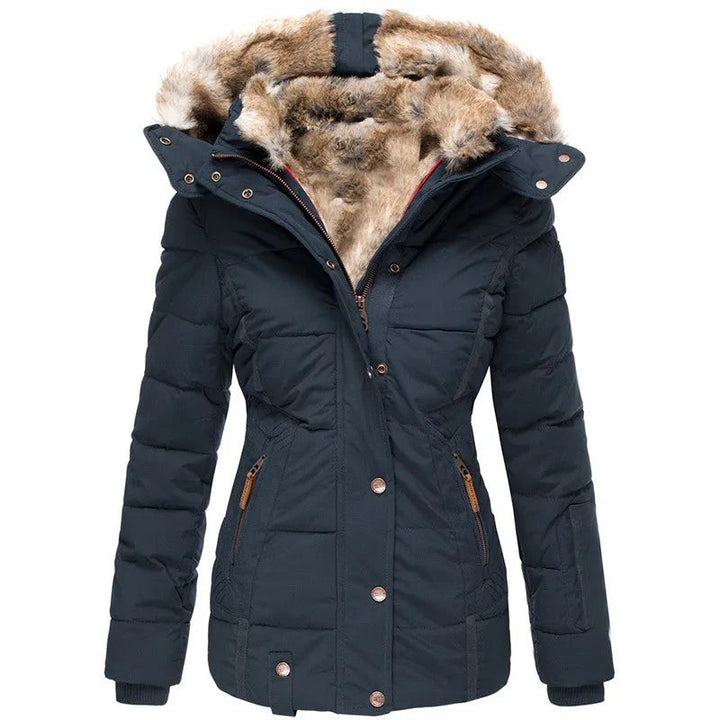 Navy quilted winter jacket with faux fur lined hood and zippers
