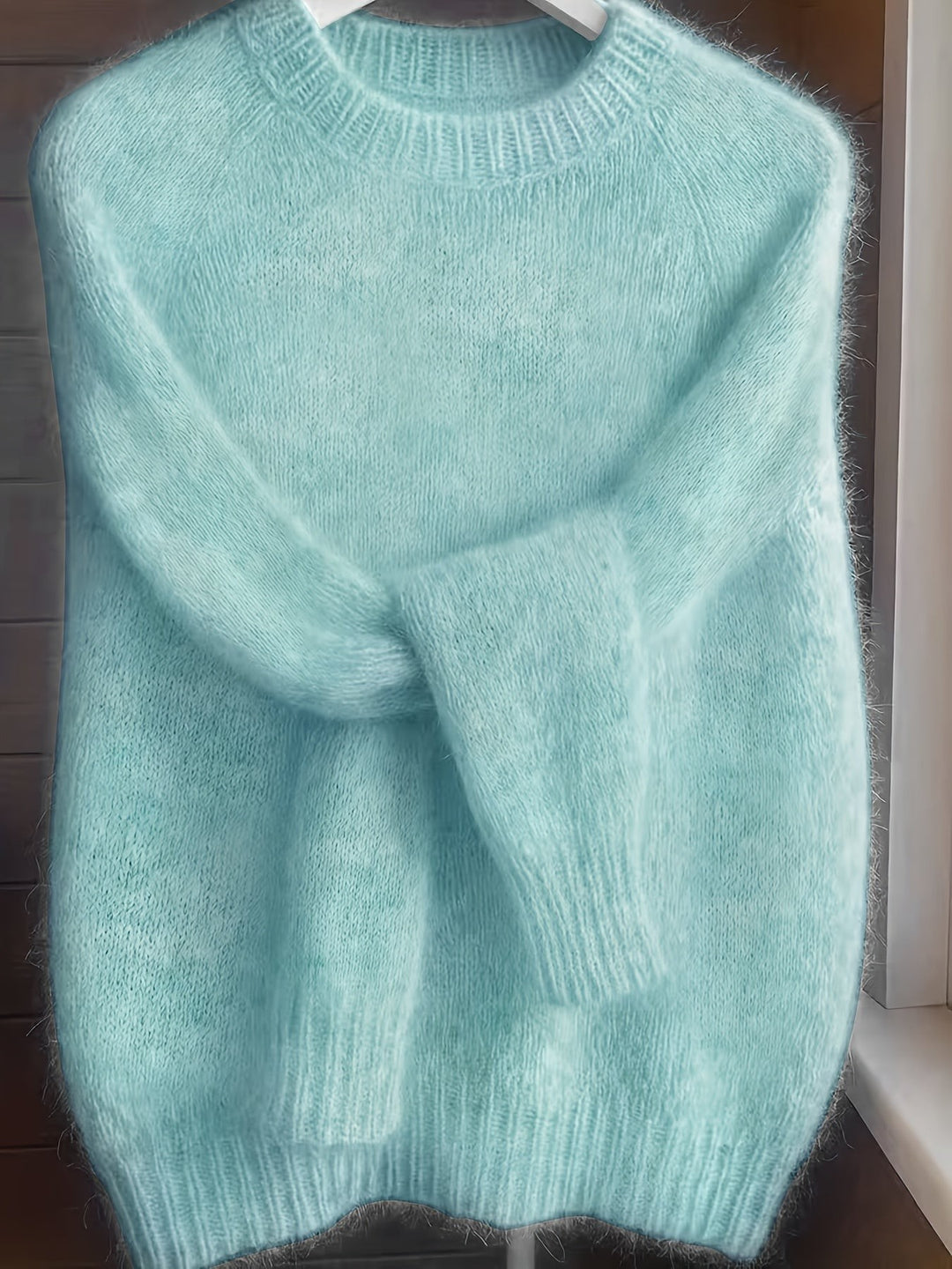Mint green fuzzy knit jumper with ribbed cuffs and round neck