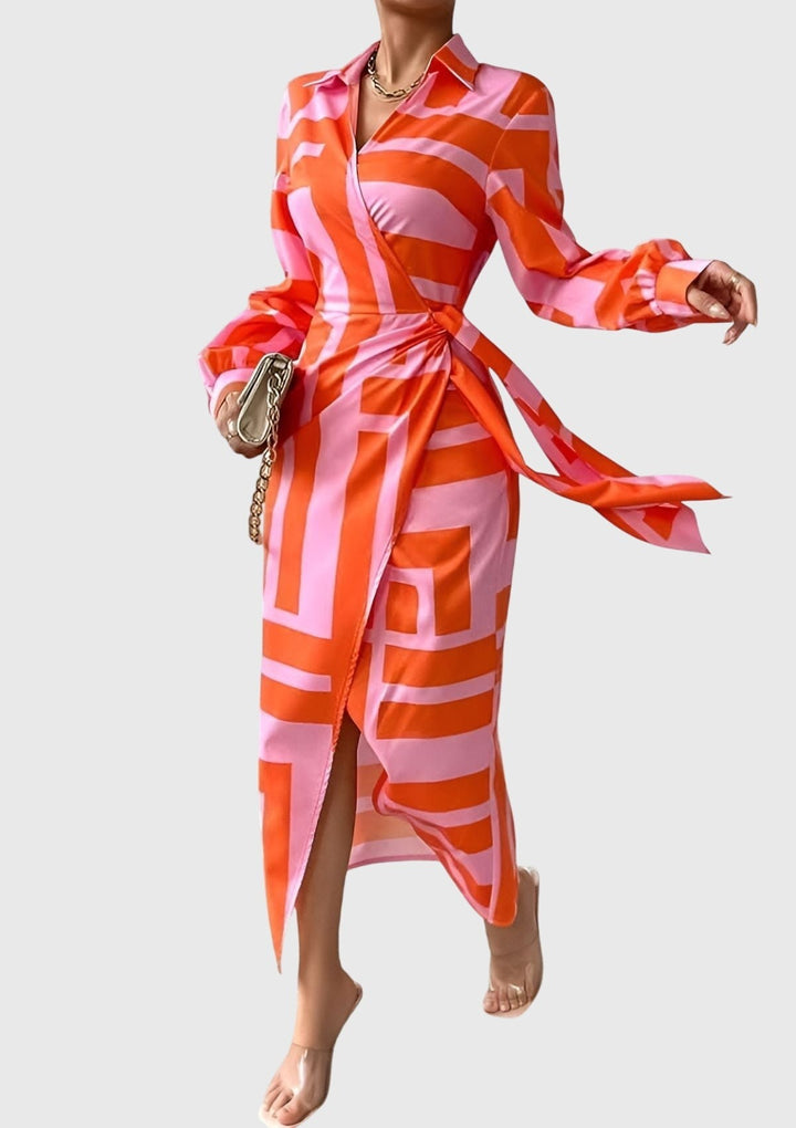 Orange and pink geometric print wrap dress with long sleeves and side tie