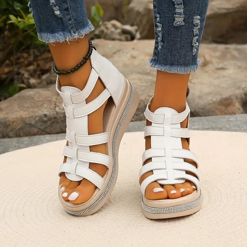 white caged wedge sandals with multi-strap front and glittery sole trim