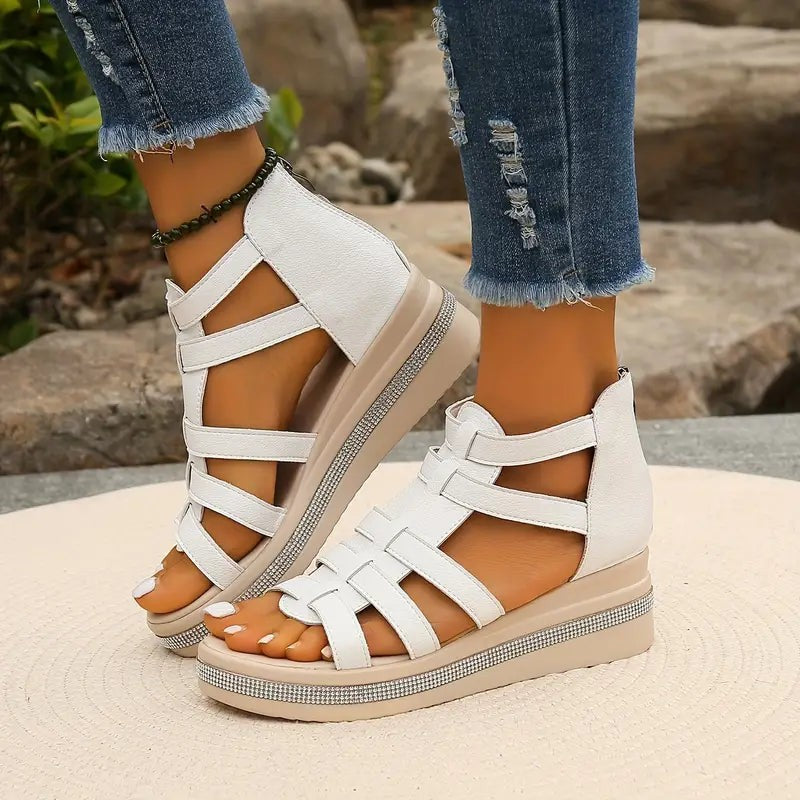 white strappy wedge sandals with woven straps and sparkly platform sole