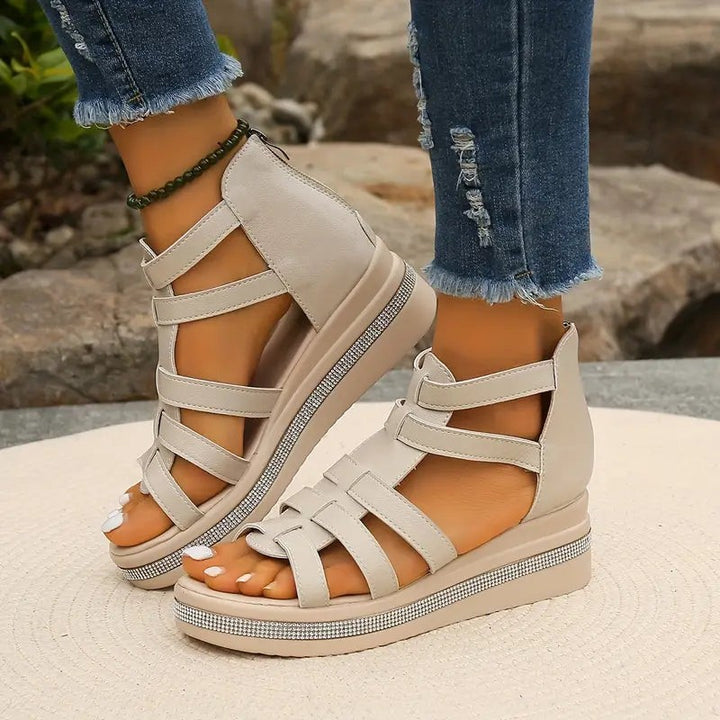 cream strappy wedge sandals with woven front straps and sparkly sole