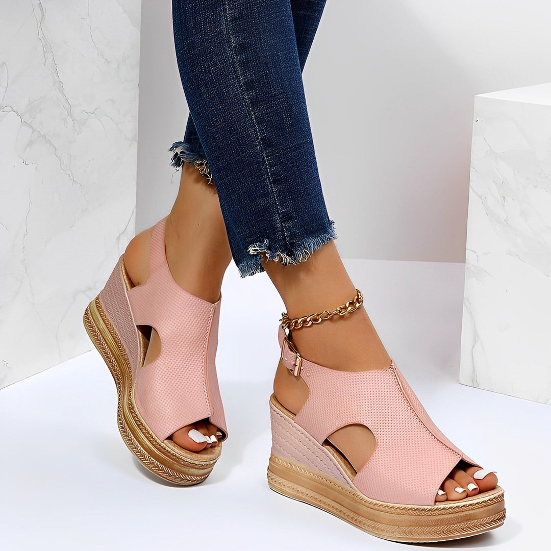 Blush pink peep-toe wedge sandals with espadrille platform and ankle strap