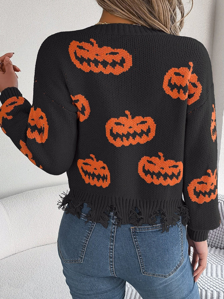 Back view of black Halloween sweater with orange pumpkin faces knit design