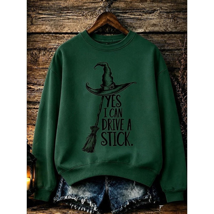dark green crew neck sweatshirt featuring witch hat and broomstick Halloween print