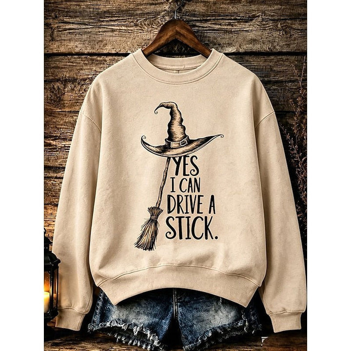 beige crew neck sweatshirt with witch hat graphic and Halloween text design