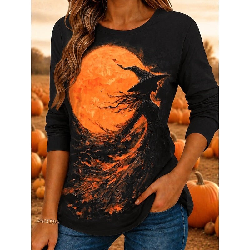 Black long-sleeve top with witch and orange moon Halloween graphic