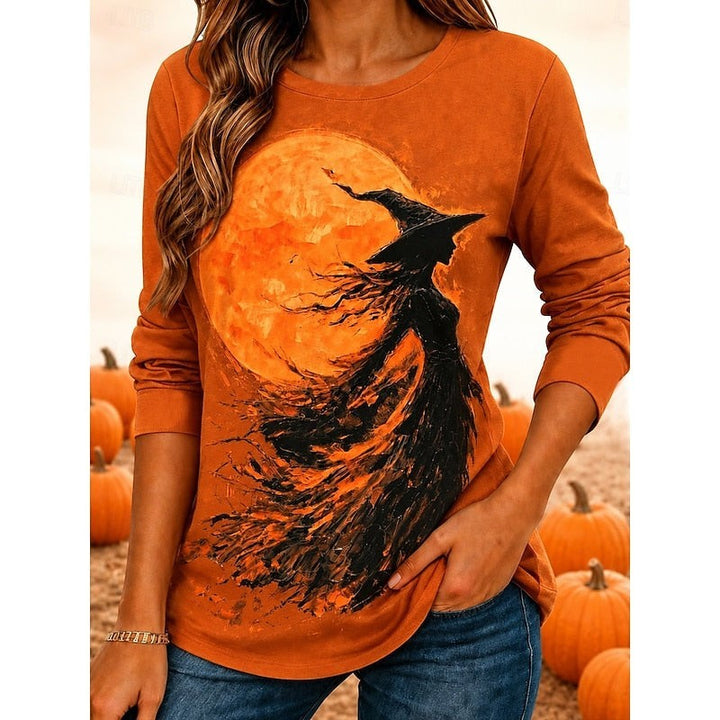 Rust orange crew neck top featuring silhouette witch and moon print