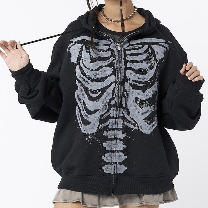 Black oversized zip-up hoodie with gray skeleton rib cage print, front view