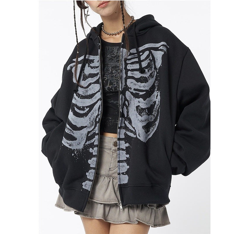 Unzipped black hoodie showing full skeleton rib cage graphic and drawstring hood