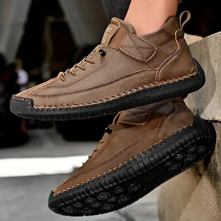 Taupe brown leather sneakers with lug sole shown from side angle