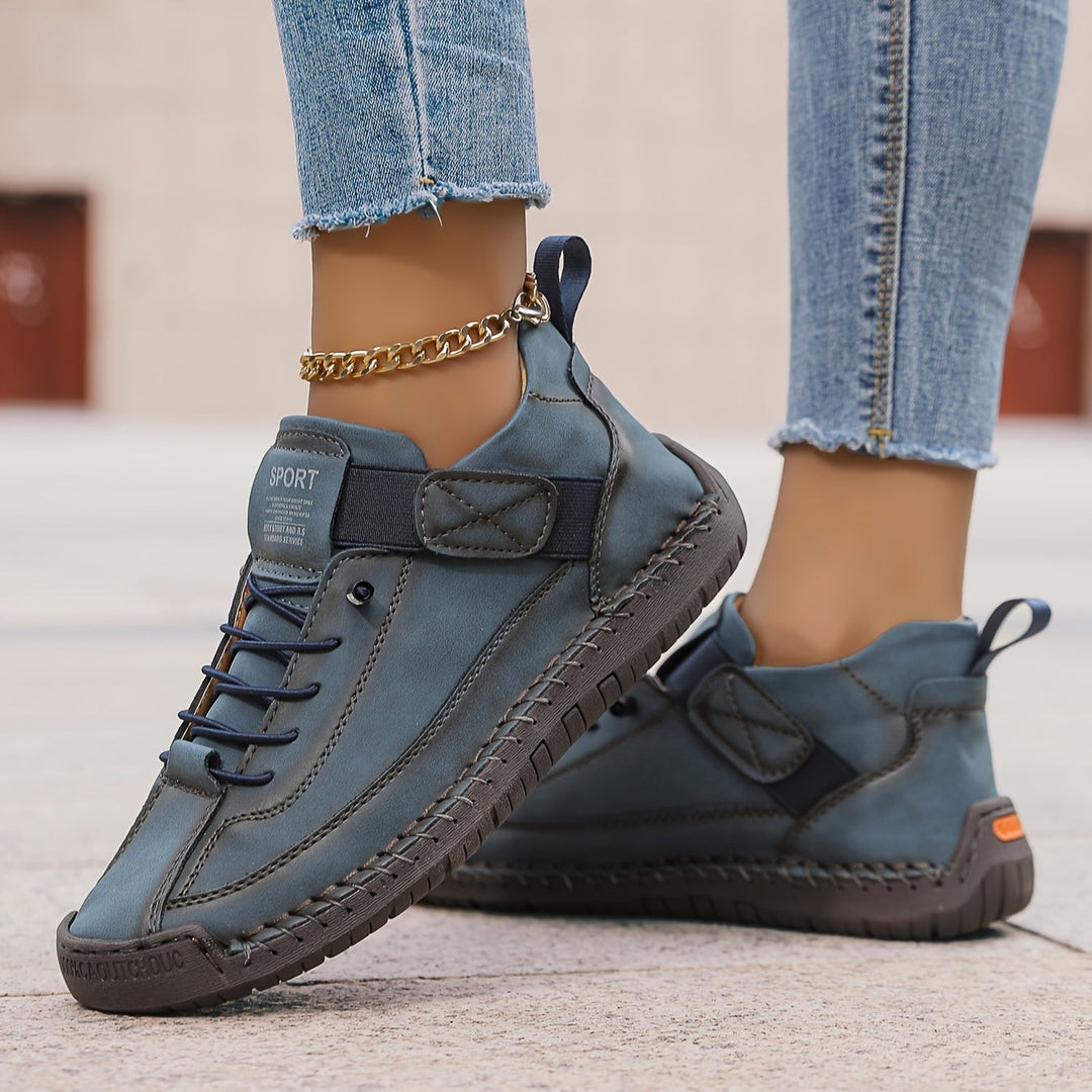 slate blue leather sneakers with lace-up front and orthopedic sole