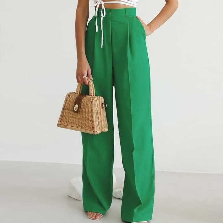 Green high-waisted wide-leg pants with pleated front detail
