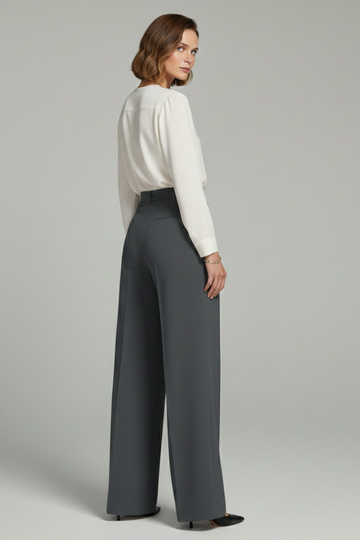 Back view of charcoal gray wide-leg trousers showing tailored fit and pockets