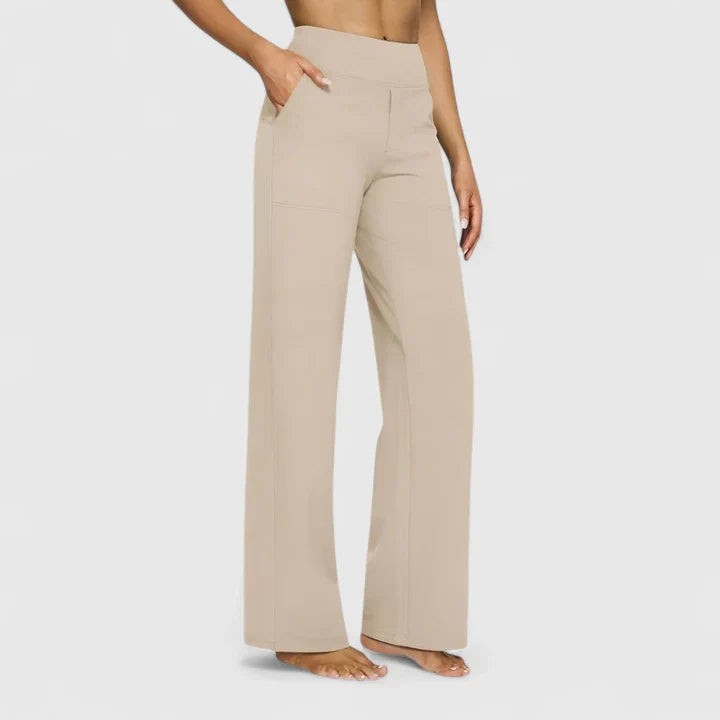 Beige high-waisted wide-leg pants with side pockets on model
