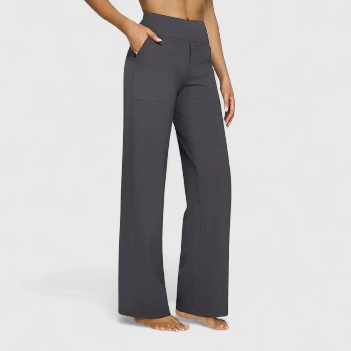 Charcoal gray high-waisted wide-leg pants with side pockets on model