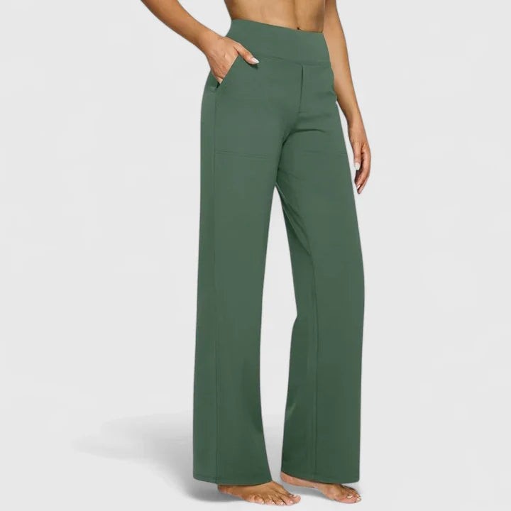 Olive green high-waisted wide-leg pants with side pockets on model