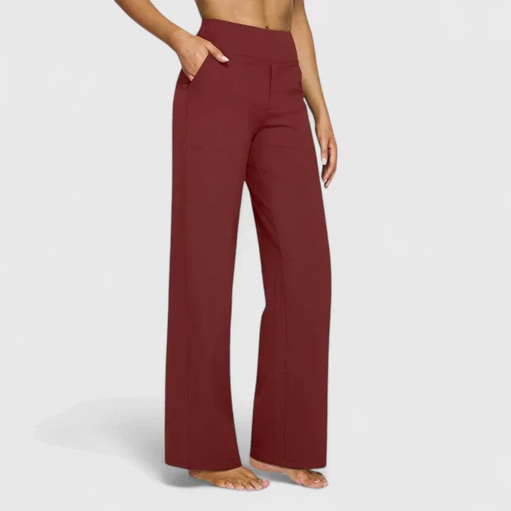 Burgundy high-waisted wide-leg pants with side pockets on model