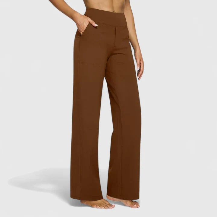 Brown high-waisted wide-leg pants with side pockets on model
