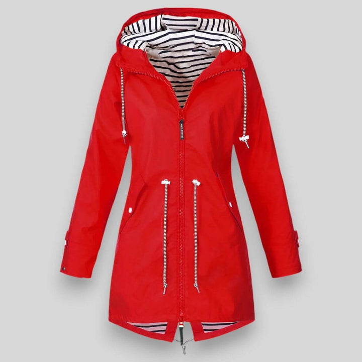 Red hooded raincoat with striped lining and toggle drawstring waist