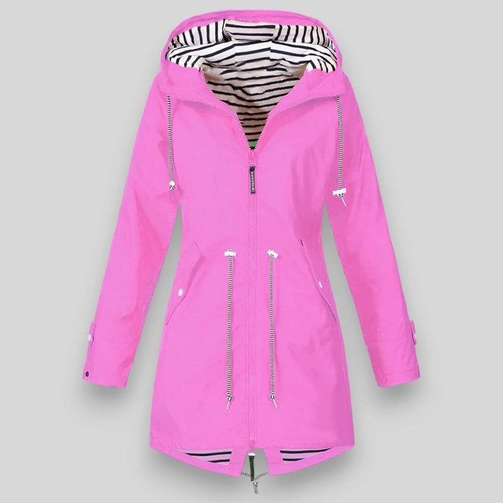 Pink hooded raincoat with striped lining and adjustable cuffs