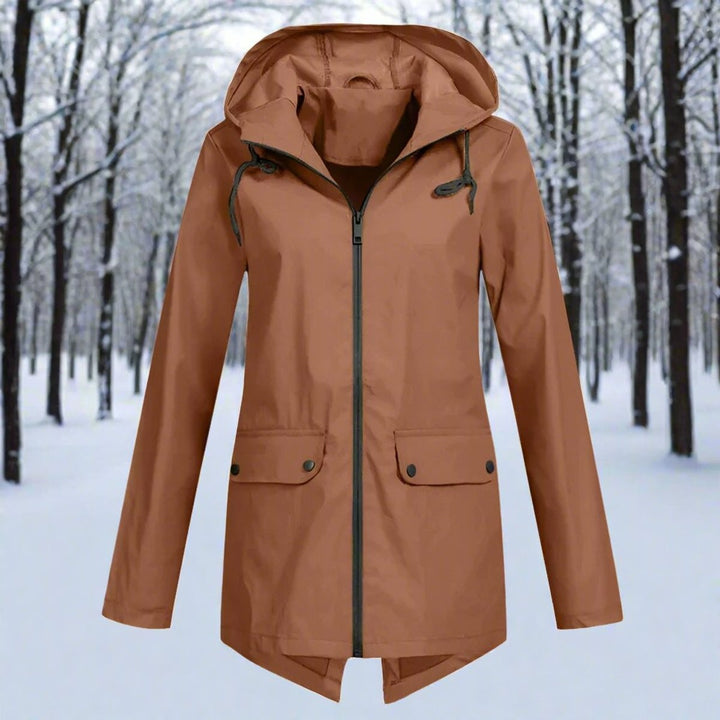 Rust brown longline rain jacket, front view with drawstring hood