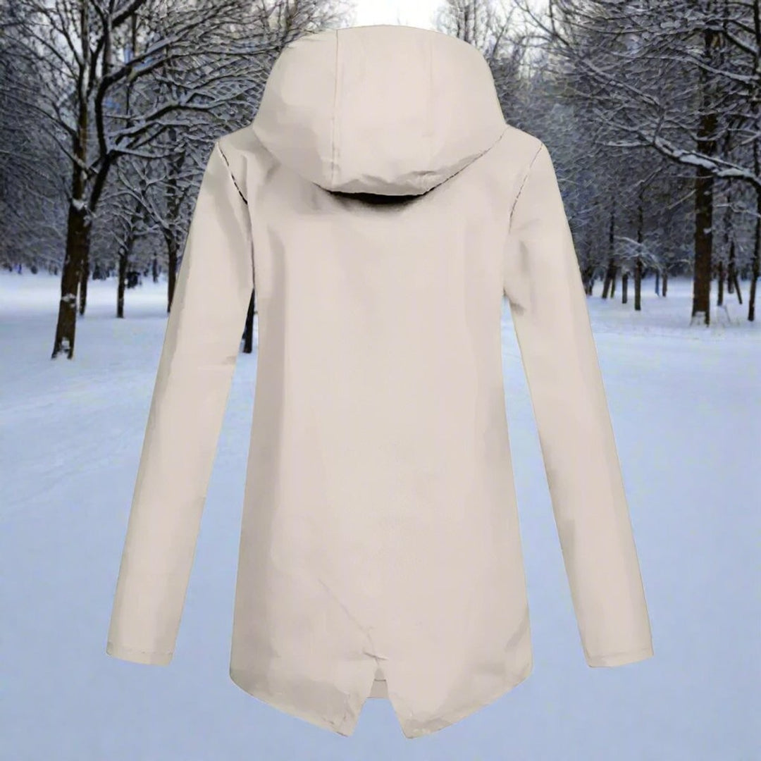 Beige hooded rain jacket back view showing longline hem and drawstring hood
