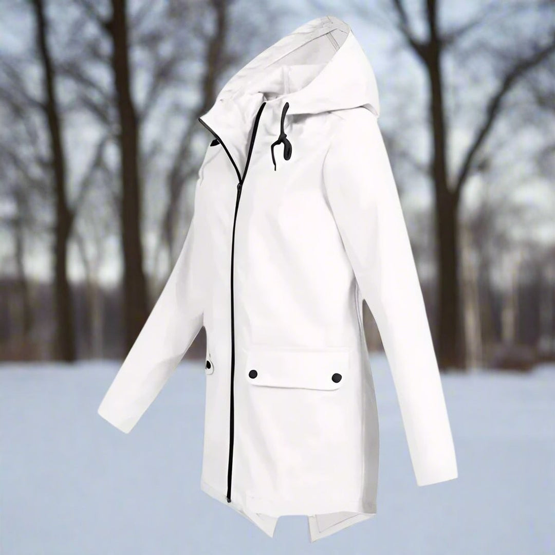 White hooded rain jacket with front zipper, side view in winter forest