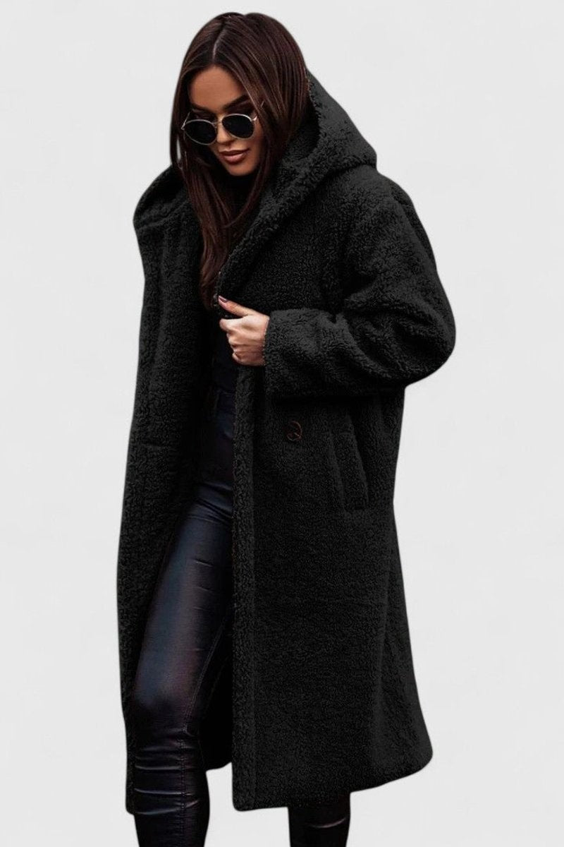 Black long teddy fleece coat featuring a relaxed hooded silhouette