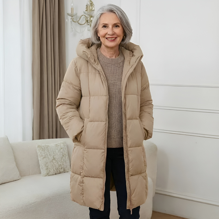Beige long puffer jacket with hood, quilted panels, casual winter look