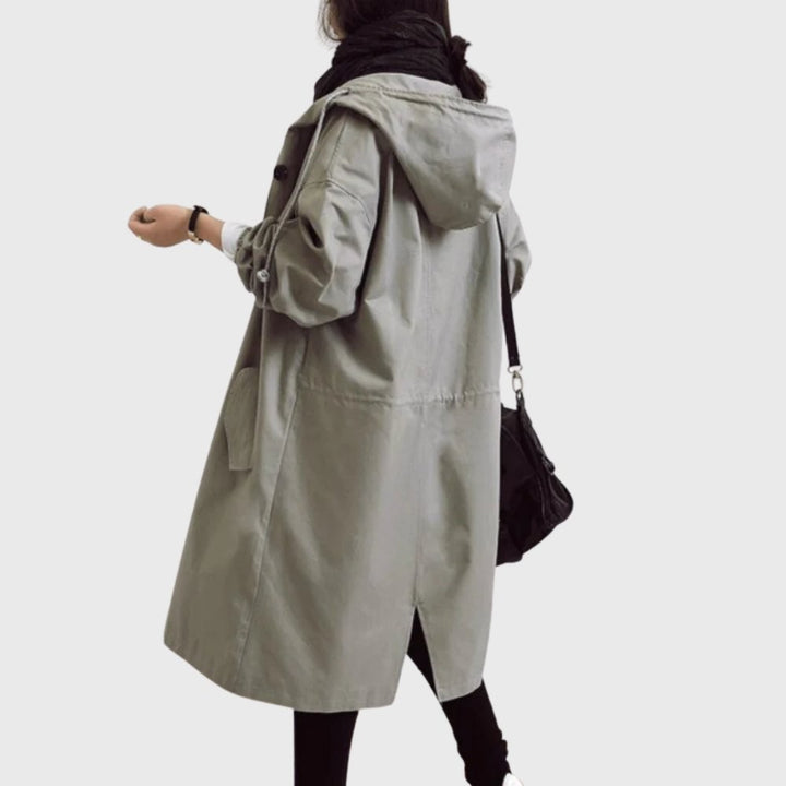 Sage green hooded trench coat with drawstring waist shown from the back