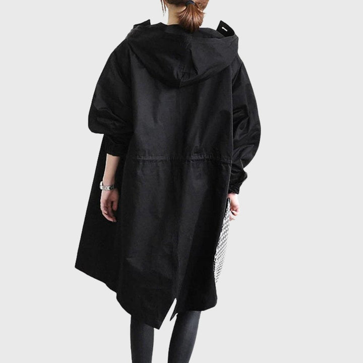Black asymmetric-hem hooded trench coat shown from the back view