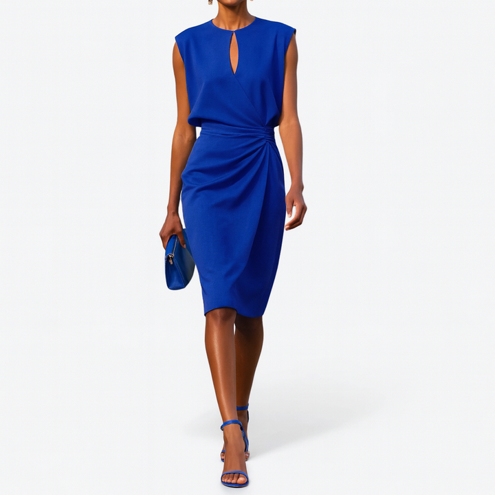Cobalt blue sheath dress with cap sleeves, keyhole cutout, and ruched waist