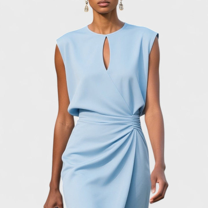 Close-up of light blue keyhole neckline dress with gathered waist ruching