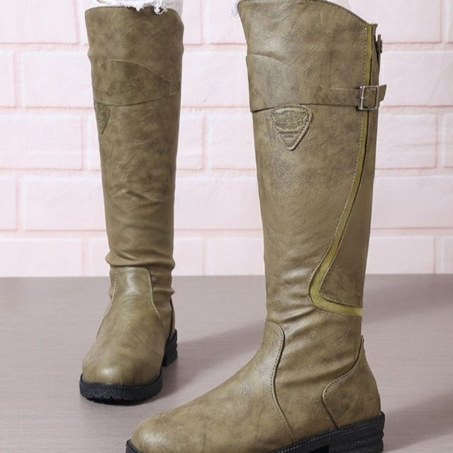 Olive green faux leather knee-high boots with side zipper and buckle accent