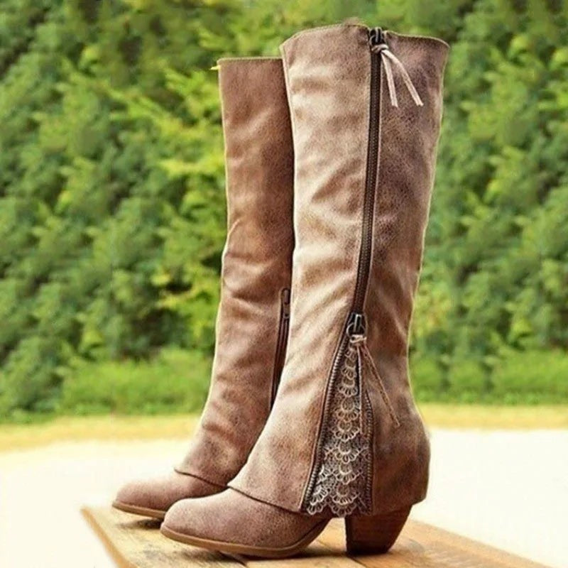 Brown leather knee-high boots with front zipper and lace trim detail