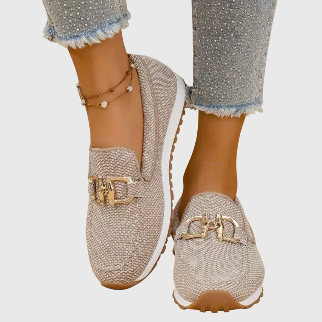 beige mesh loafers with gold horsebit accent and white platform sole