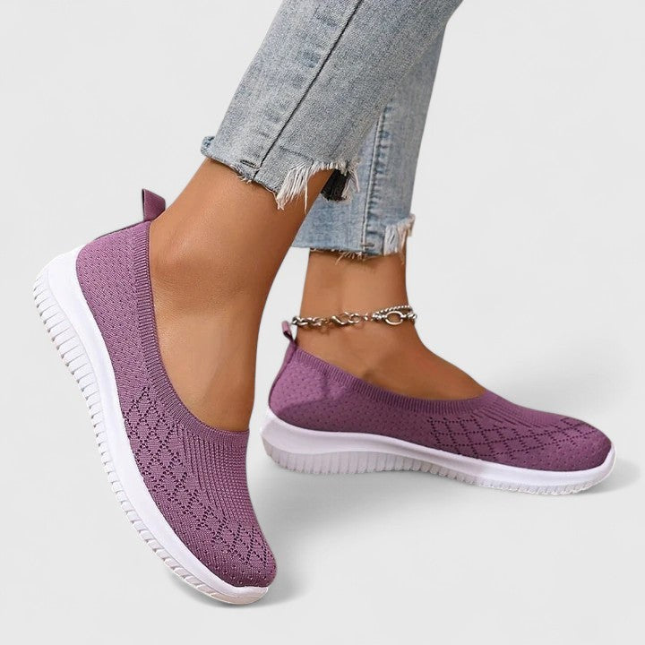 Purple knit slip-on sneakers with white sole and diamond stitch pattern