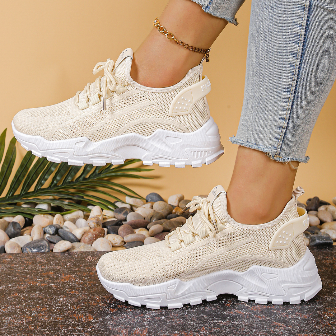 Beige knit chunky sneakers with lace-up front and white platform sole