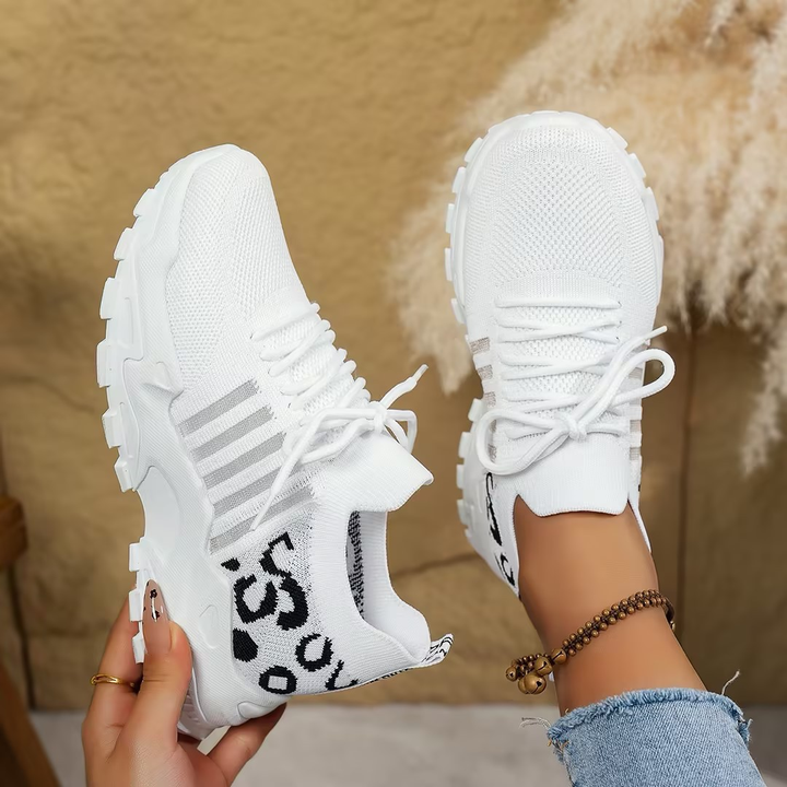 White knit sneakers with leopard print heel and chunky platform sole