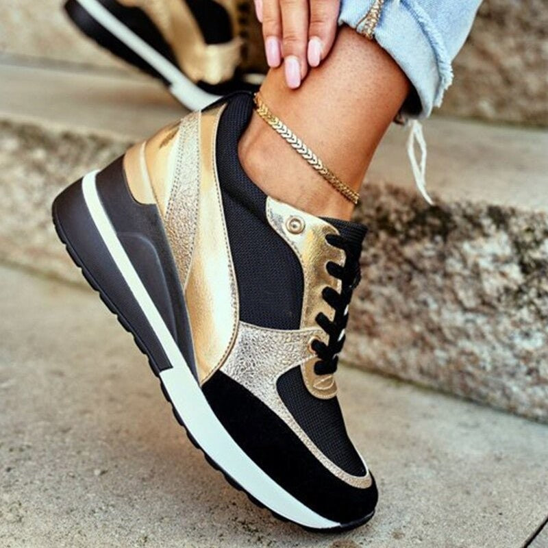 black and gold lace-up wedge sneakers with hidden platform heel
