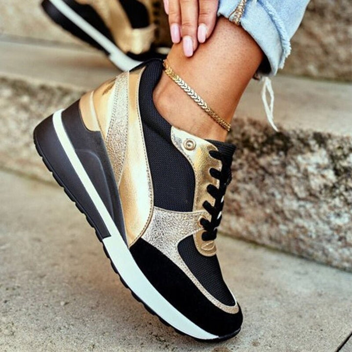 black and gold lace-up wedge sneakers with hidden platform heel