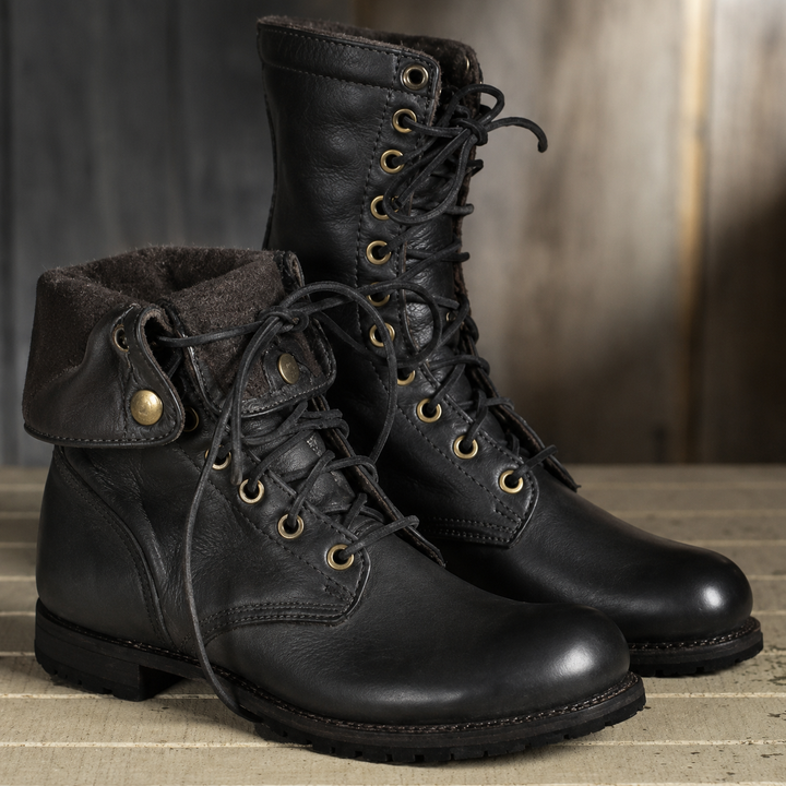 black leather lace-up boots featuring foldover cuff and wool lining