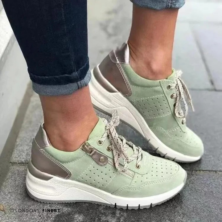 Sage green suede lace-up sneakers with side zipper and chunky white sole