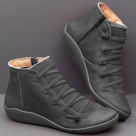 Black leather ankle boots with crisscross laces and side zip closure