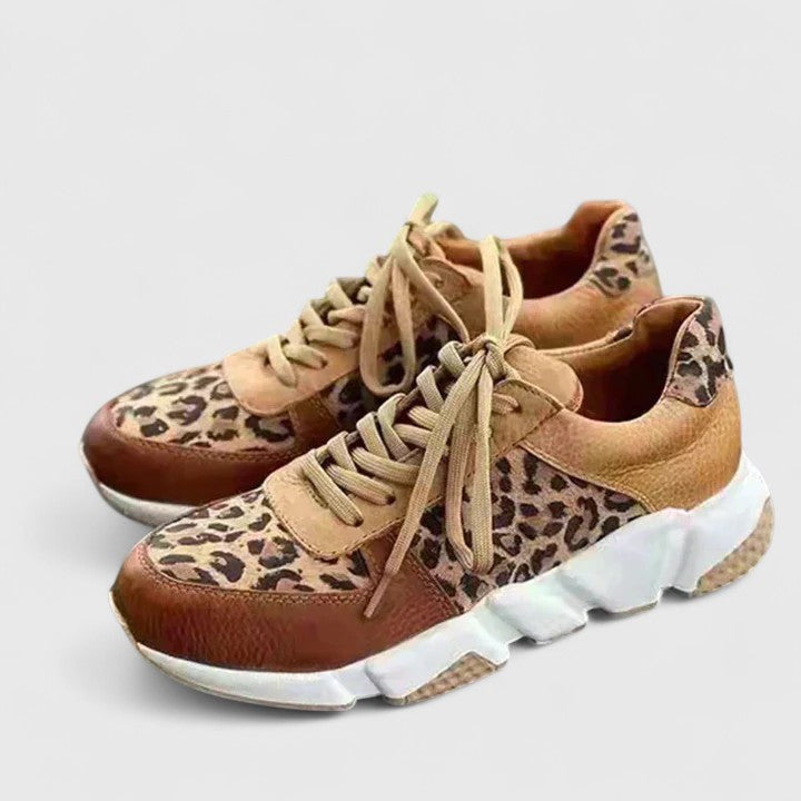 leopard-print chunky sneakers with brown leather accents and tan laces