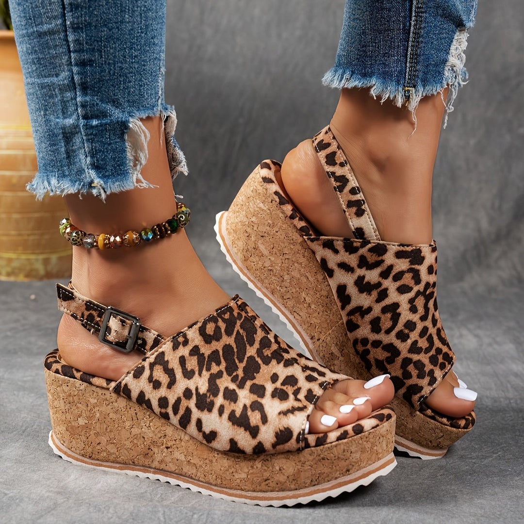 leopard print platform wedge sandals featuring slingback buckle strap design