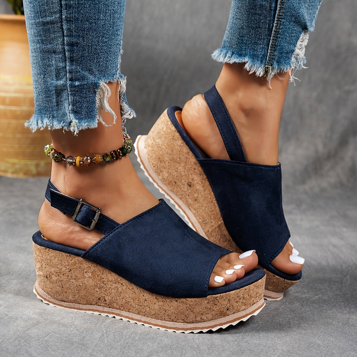navy blue wedge sandals with slingback ankle strap and cork platform sole