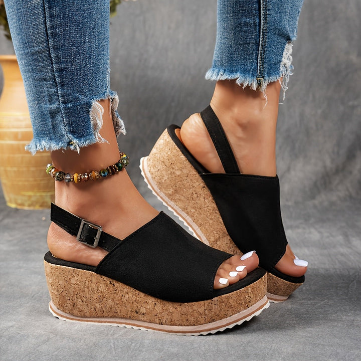 black platform wedge sandals with open toe and adjustable buckle strap